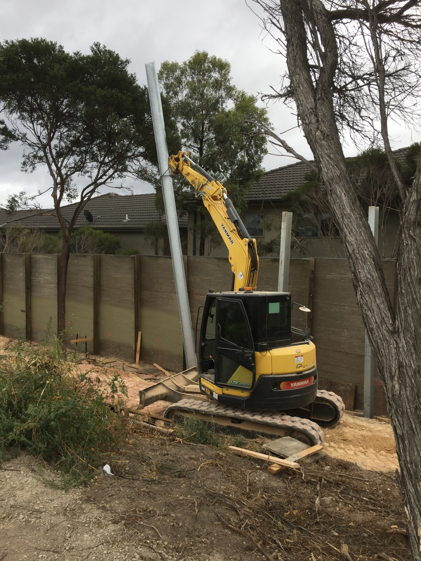 Retaining wall and post installation